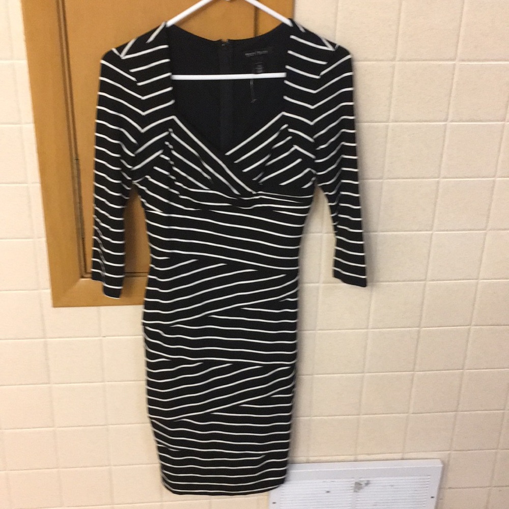Instantly slimming black and white striped dress